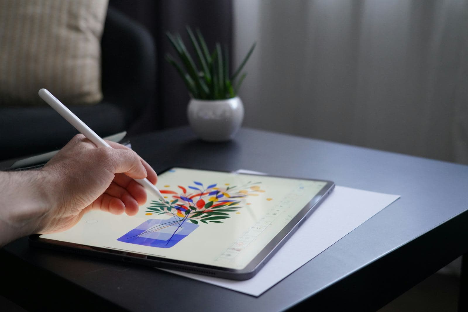 A colorful illustration being drawn on an iPad
